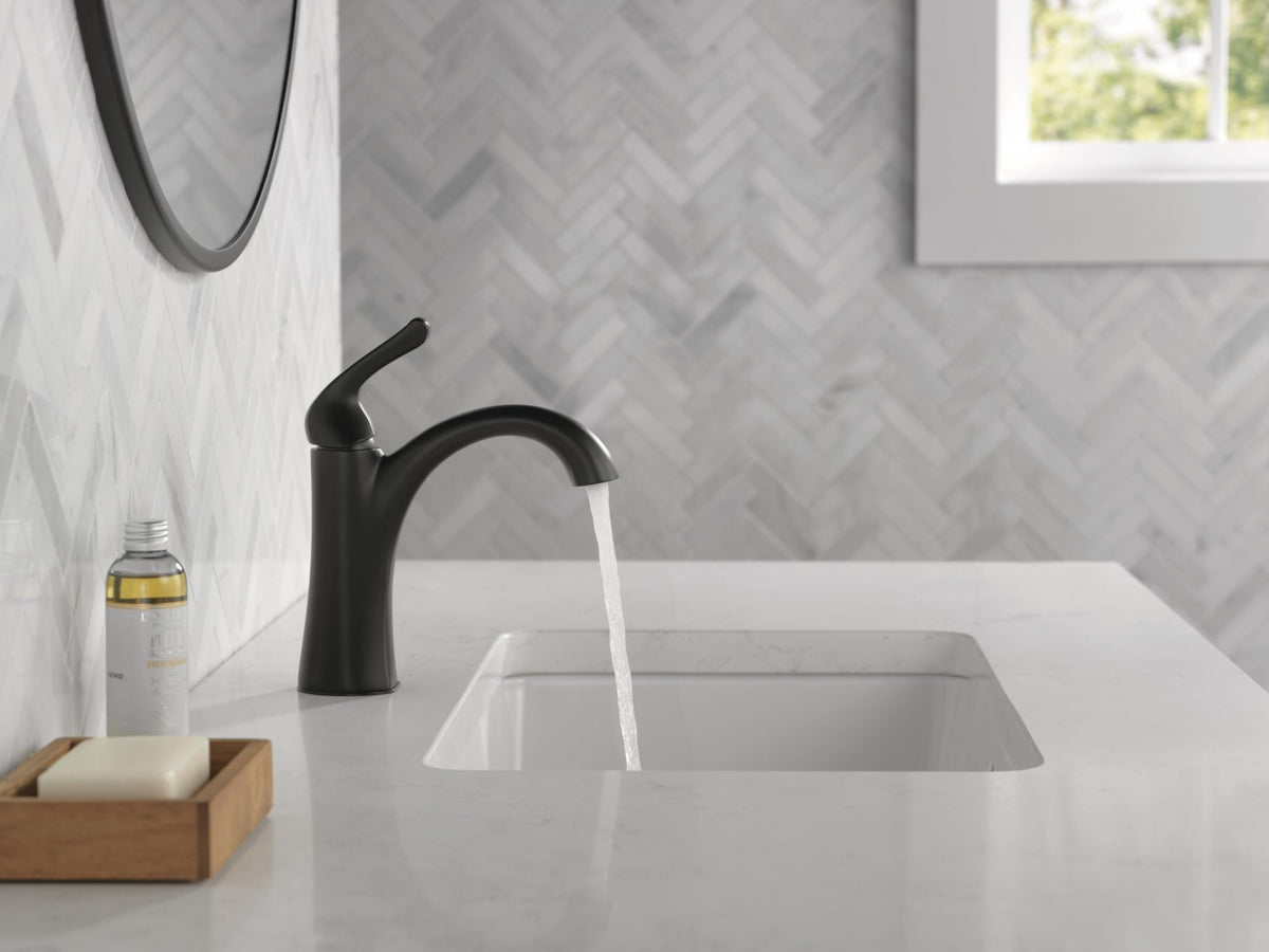Delta Arvo faucet installed in a modern vanity setup for daily use