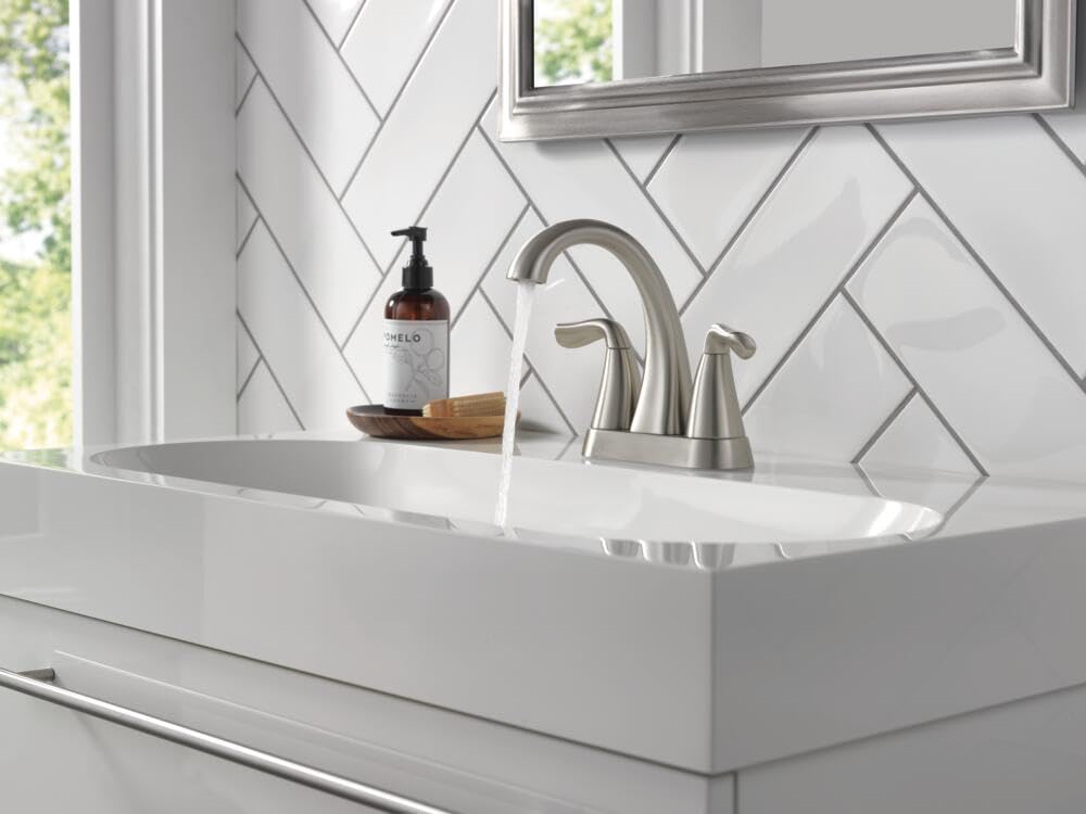Close-up of Delta Arvo SpotShield brushed nickel finish showing water spot resistance