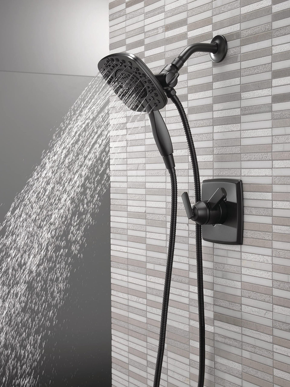 Delta Ashlyn In2ition dual shower in use with head and handheld