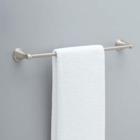 Delta Becker 24-inch towel bar side view highlighting slim wall-mounted profile