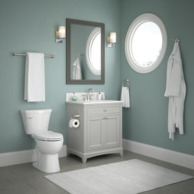 Delta Becker towel ring shown in a modern bathroom setup.