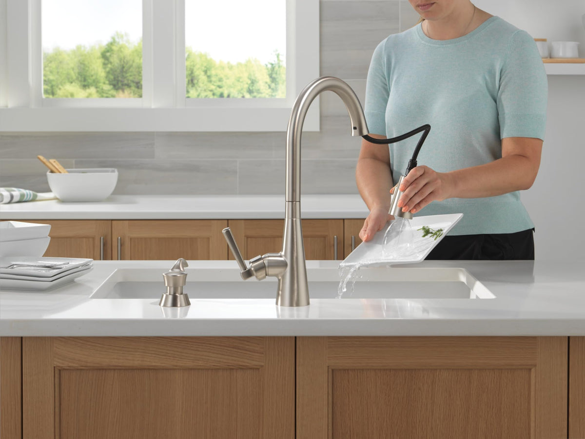 ShieldSpray feature on Delta Boyd faucet for contained splatter and easier mess control