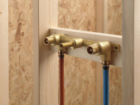 Delta brass valve body ideal for durable, long-lasting wall installation.