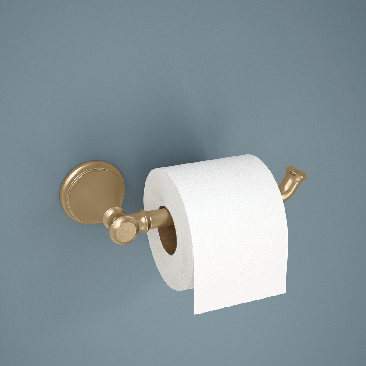 Close-up of Delta Cassidy champagne bronze finish on the toilet paper holder.