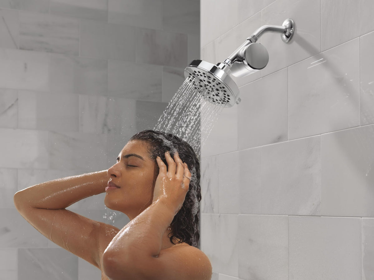 DELTA Clarifi shower filter attachment compact design fits behind your existing head.
