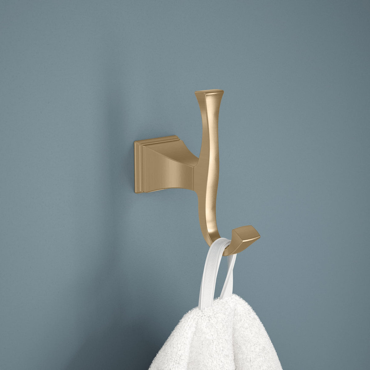 Delta Dryden towel hook side view highlighting sleek geometry and finish.