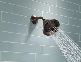 Delta Faucet 3-Spray Shower Head Venetian Bronze angled view for easy installation