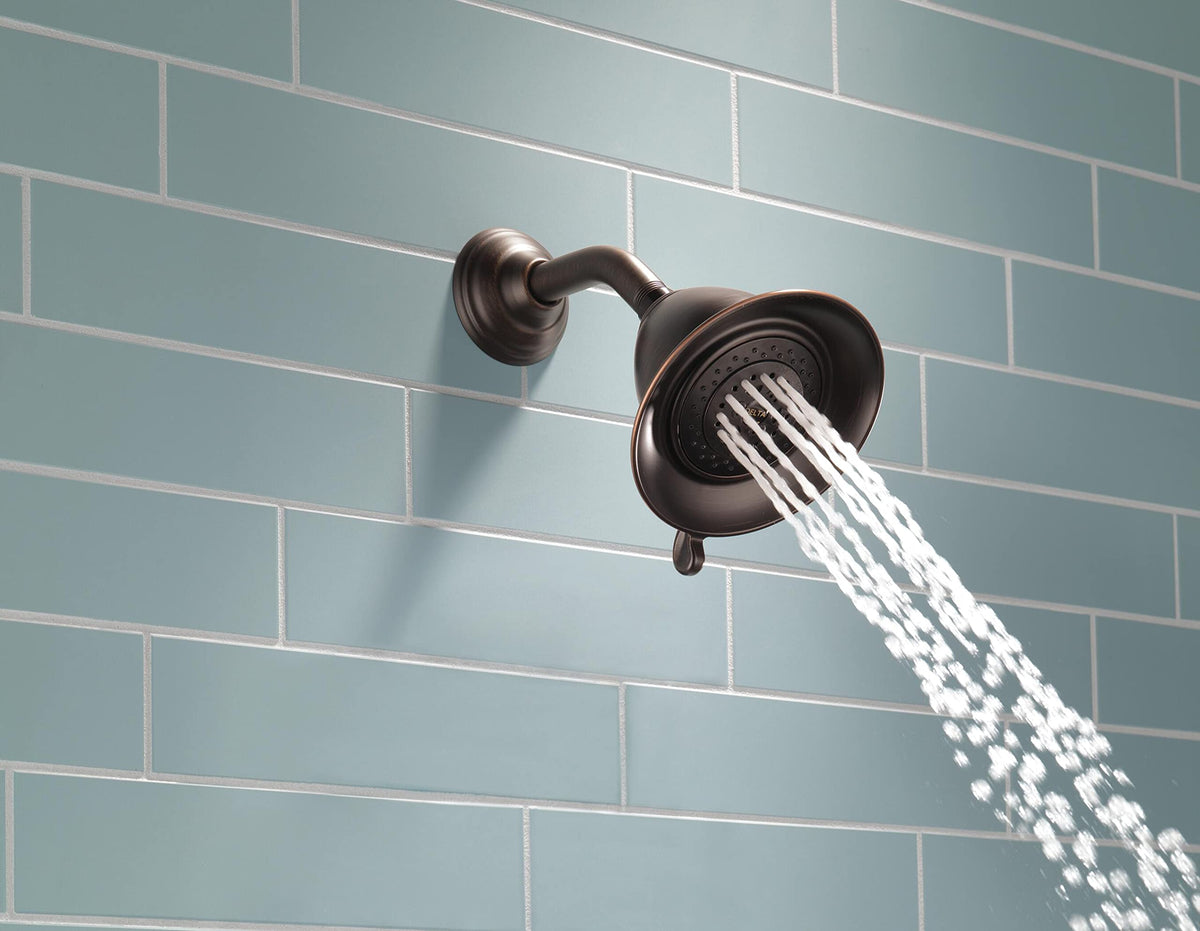 Delta Faucet 3-Spray Shower Head Venetian Bronze finish closeup
