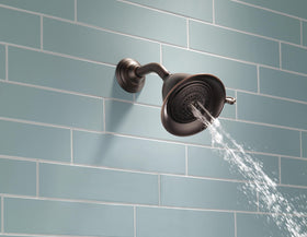 Delta Faucet 3-Spray Shower Head Venetian Bronze packaging and components