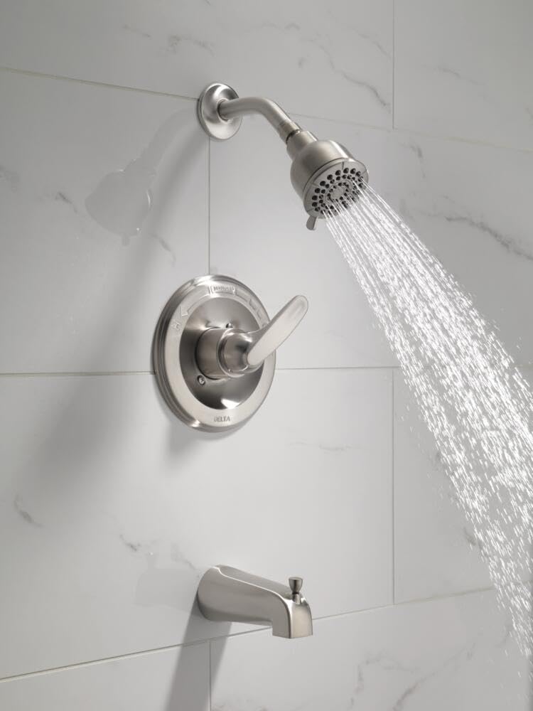 Brushed nickel Delta Foundations shower head highlighting a durable finish.