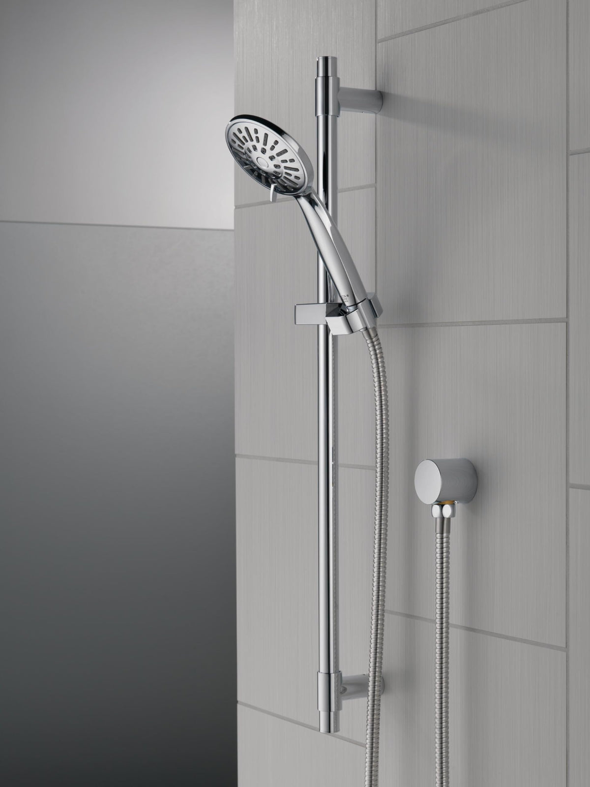 Delta handheld shower head with hose for easy rinsing pets and hard-to-reach areas.