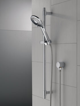 Delta handheld shower head with hose for easy rinsing pets and hard-to-reach areas.