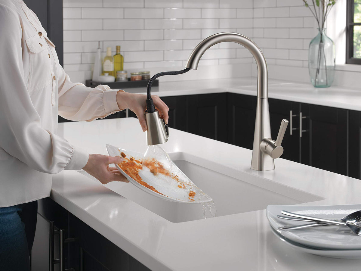 Delta Lenta brushed nickel faucet in single-hole installation with deck plate