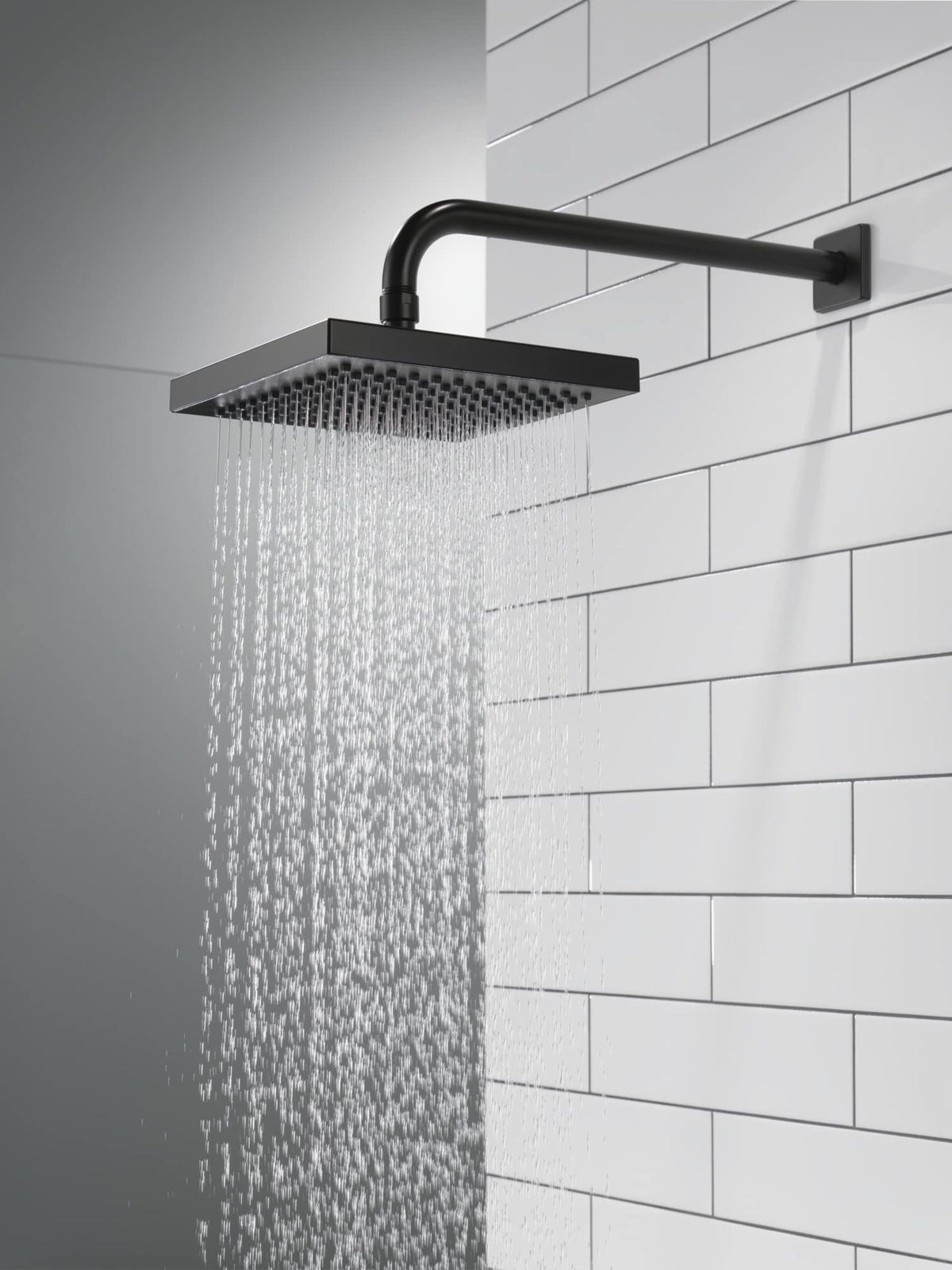 Delta matte black wall-mount showerhead for simple installation.