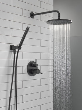 Delta Modern 14 Series shower arm with matte black finish for a sleek look.