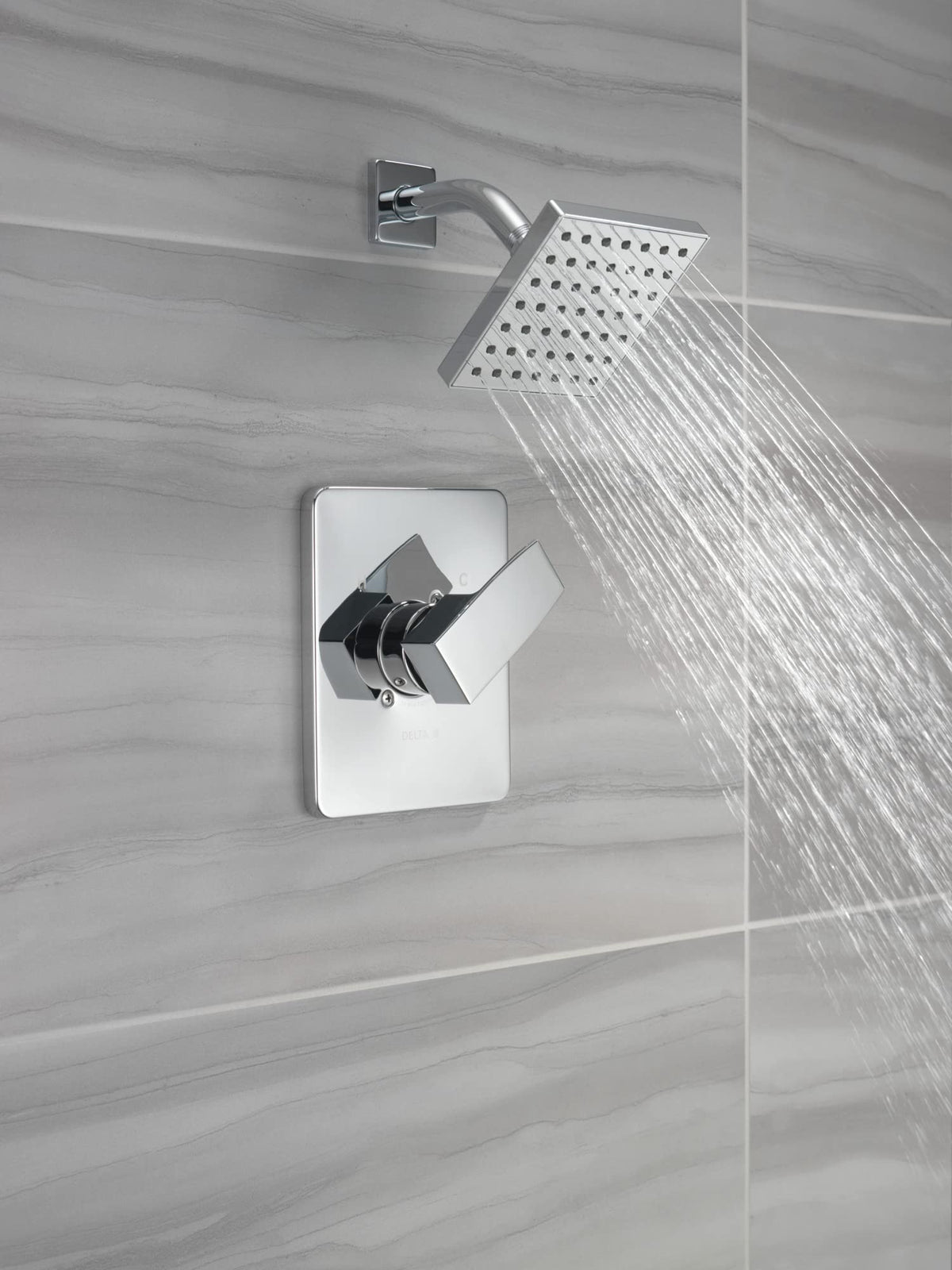 Delta Modern 14 Series shower handle provides smooth operation and contemporary chrome styling.