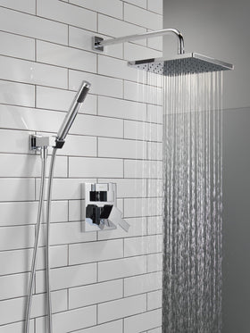 Delta Modern 14 shower arm extends the rain head for broad coverage.