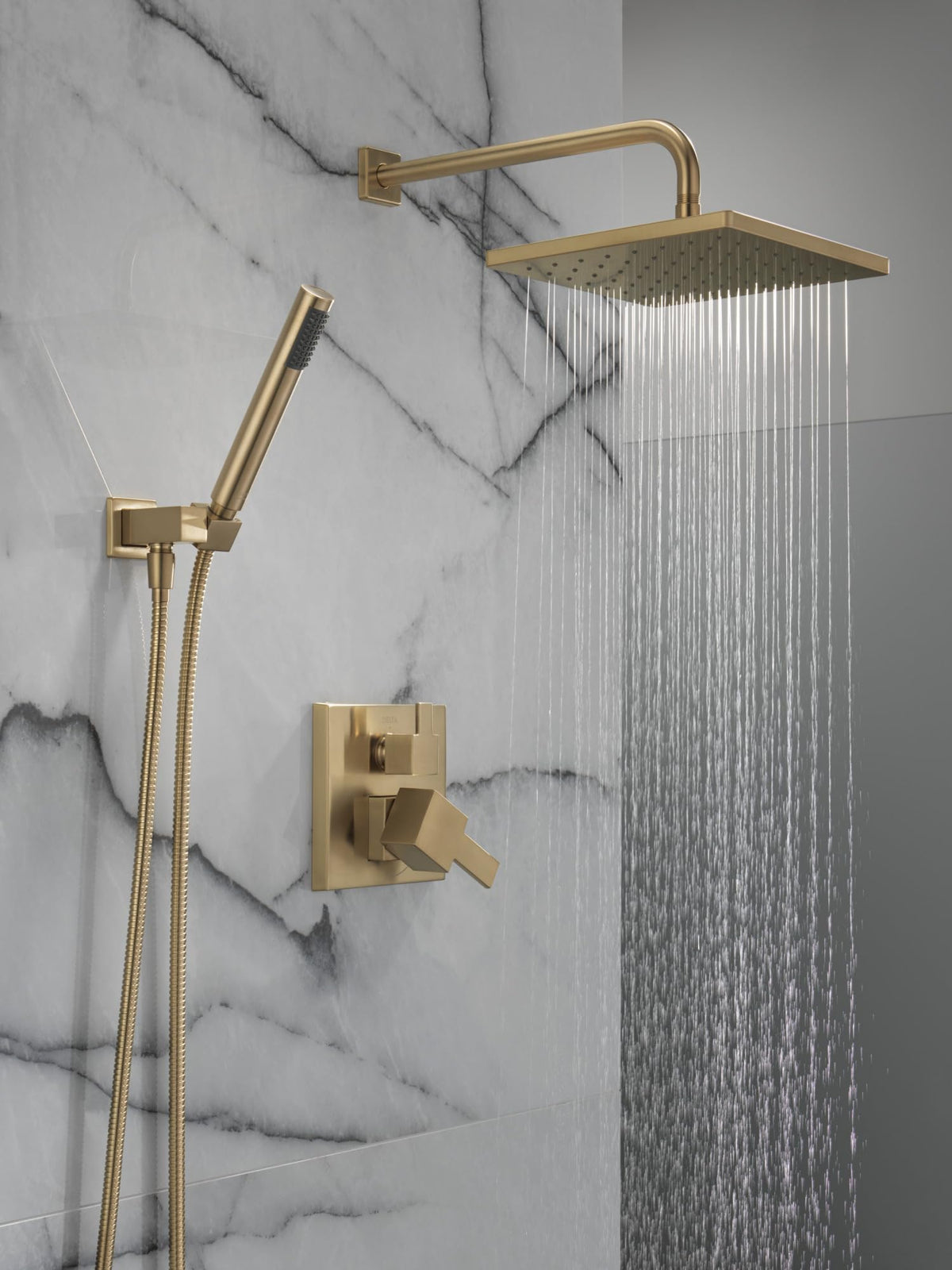 Delta Modern 14 handheld shower offers flexible rinsing in champagne bronze.