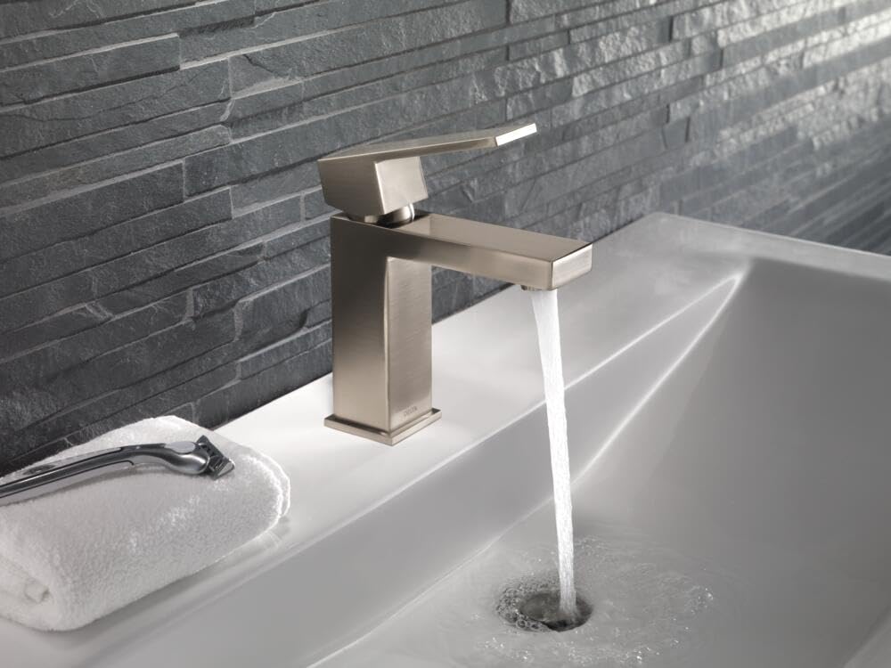 Vanity setup featuring Delta faucet for a contemporary style