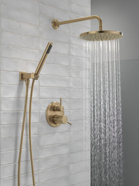 Delta Modern handheld shower in champagne bronze for targeted rinsing