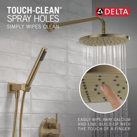 Delta shower arm in champagne bronze matches the rainfall head
