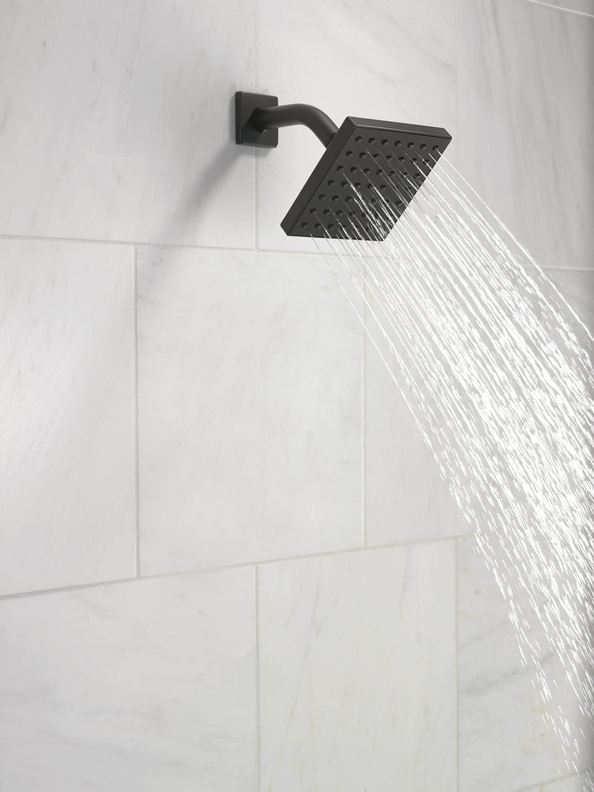 Delta Modern spray face close-up showing Touch-Clean holes for quick mineral removal.