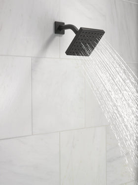 Delta Modern spray face close-up showing Touch-Clean holes for quick mineral removal.
