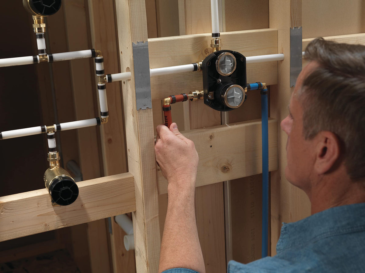 Delta monitor pressure balance valve maintains safe water temperature during showers.