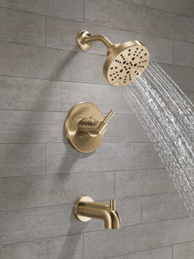 Delta Nicoli brushed-gold handle highlights elegant design with durable finish.
