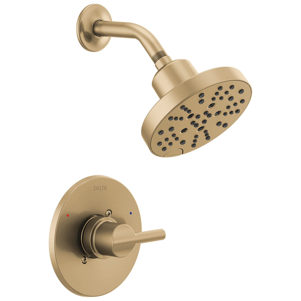 Delta Nicoli 14 Series shower head in Brushed Gold provides 3x coverage for a warm shower.