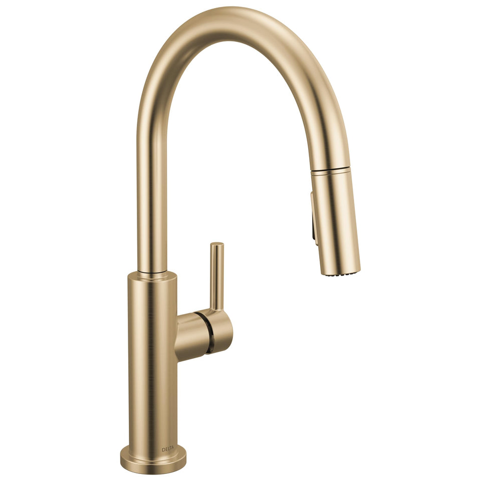 Delta Nicoli pull-down spray faucet in brushed gold delivers versatile spray control.