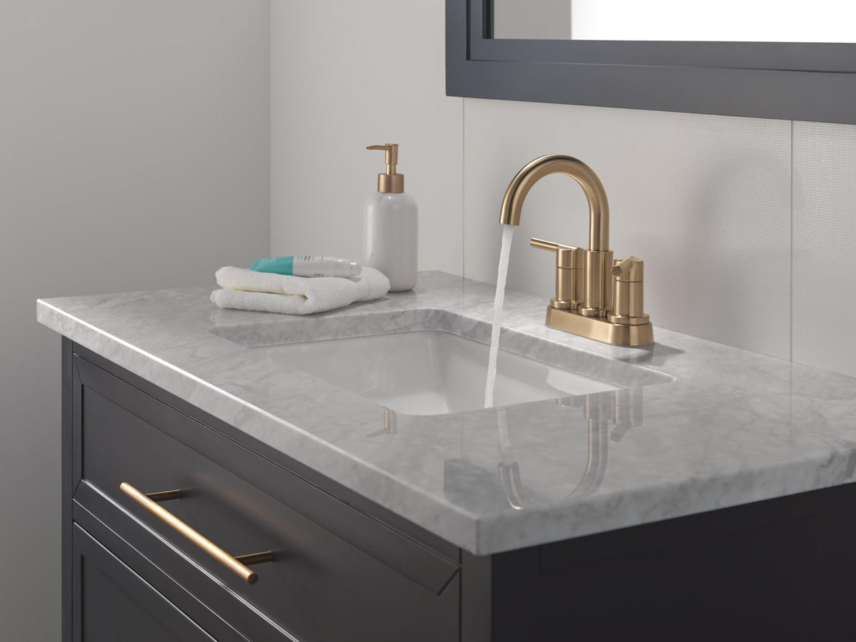 Delta Nicoli Champagne Bronze faucet elevates bathroom aesthetics.