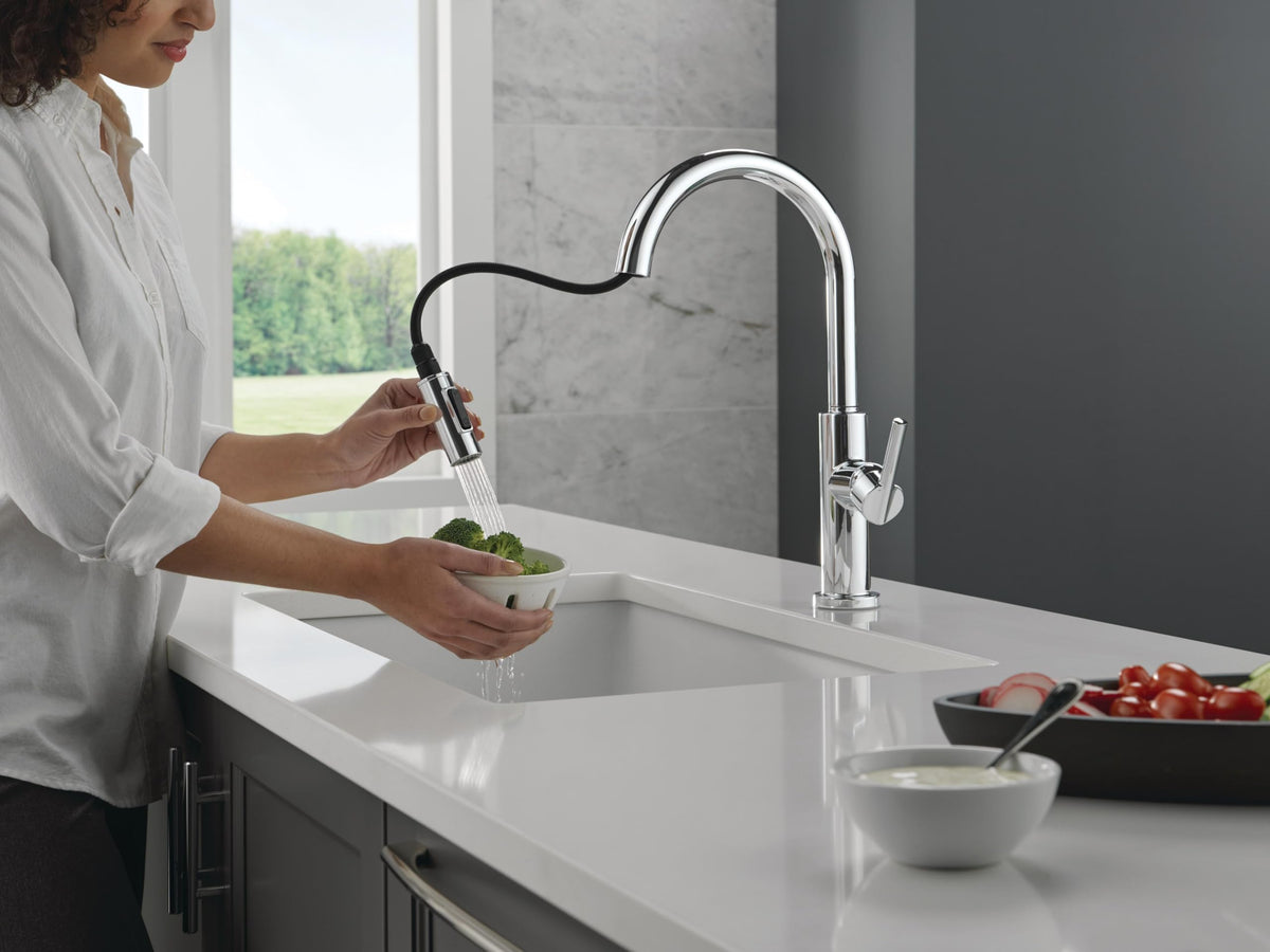 Delta Nicoli chrome faucet with MagnaTite Docking secures the spray head