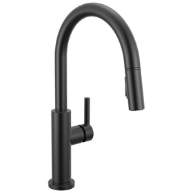 Delta Nicoli faucet pull-down docked sprayer demonstrating secure MagnaTite docking for easy use