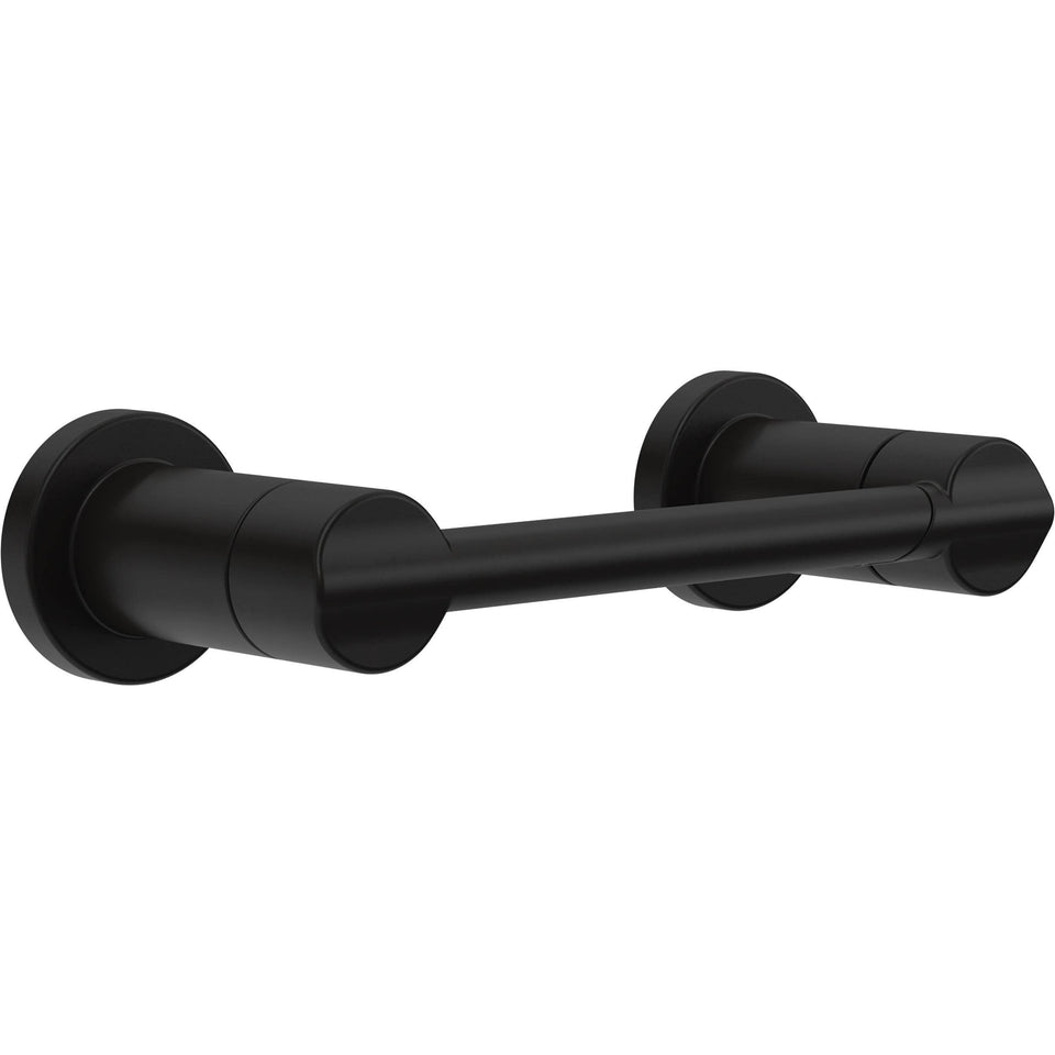Delta Nicoli pivoting toilet paper holder on wall for easy roll changes.