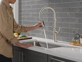 Delta Rhett Pro Style with MagnaTite dock keeps spray head securely docked.