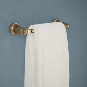 Delta Saylor towel rack with champagne bronze finish on wall