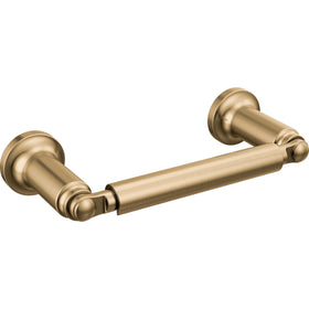Delta Saylor wall-mounted pivot-arm toilet paper holder in champagne bronze, ideal for compact bathrooms.