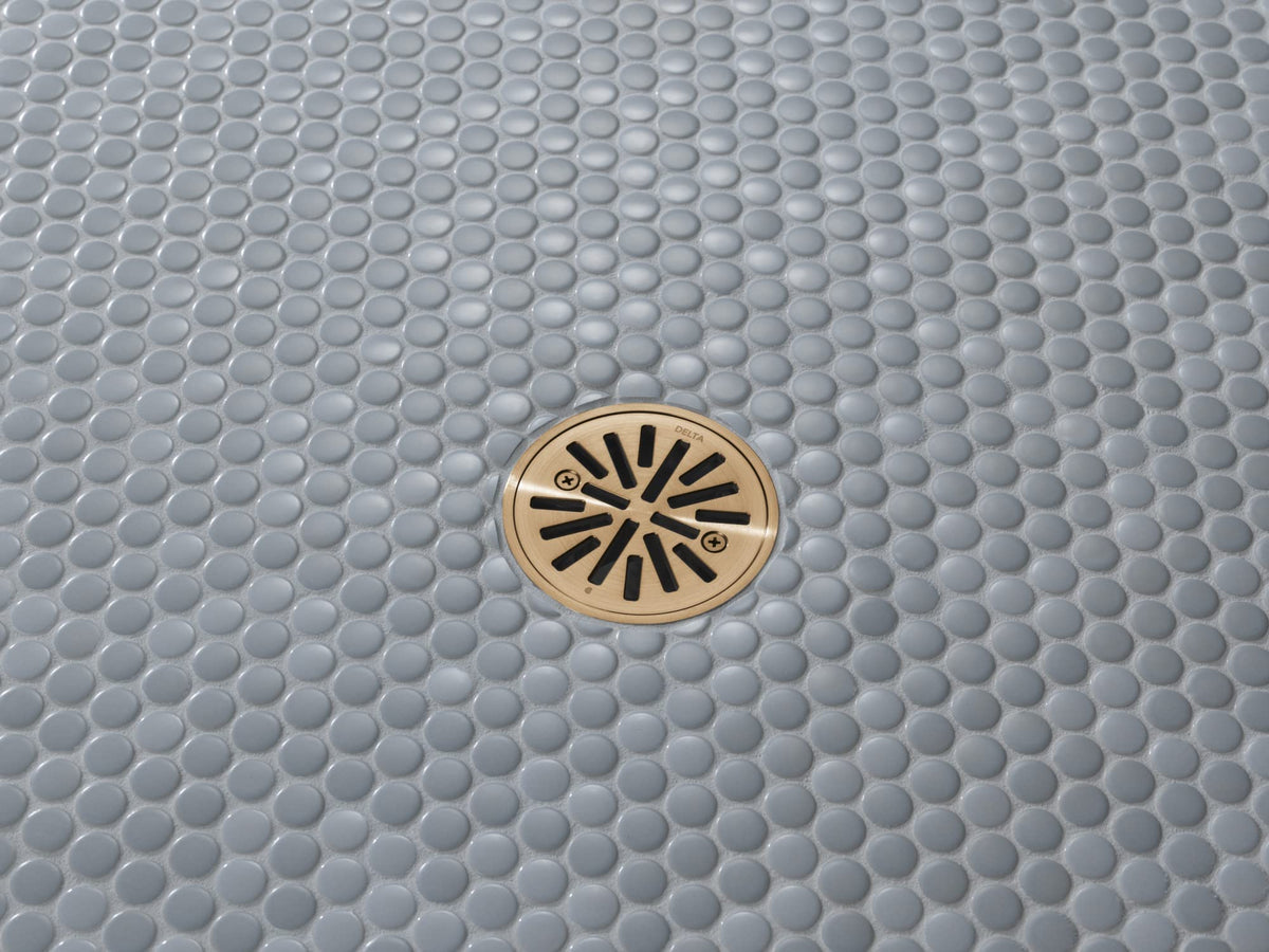 Delta tile-in round drain with gasket and removable gate for easy maintenance