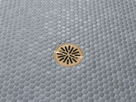 Delta tile-in round drain with gasket and removable gate for easy maintenance