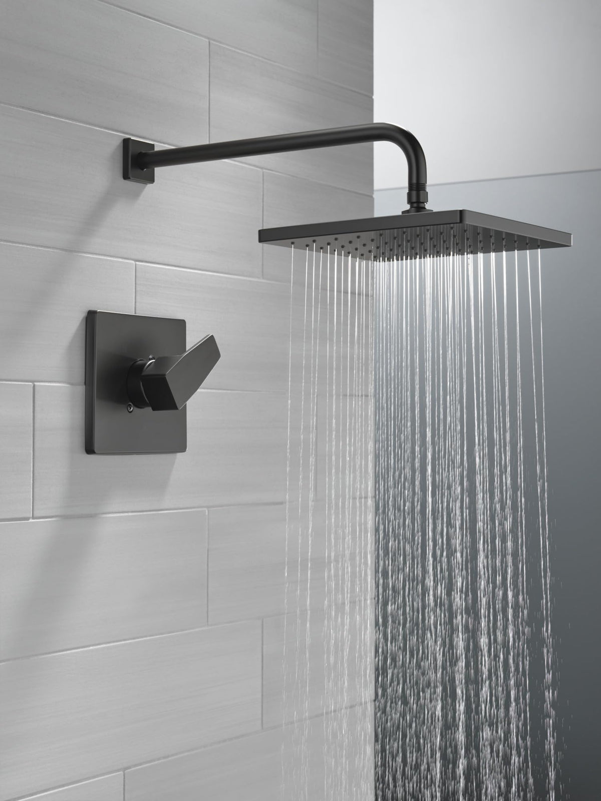 Delta matte black shower trim kit enhances contemporary style with durable finish.