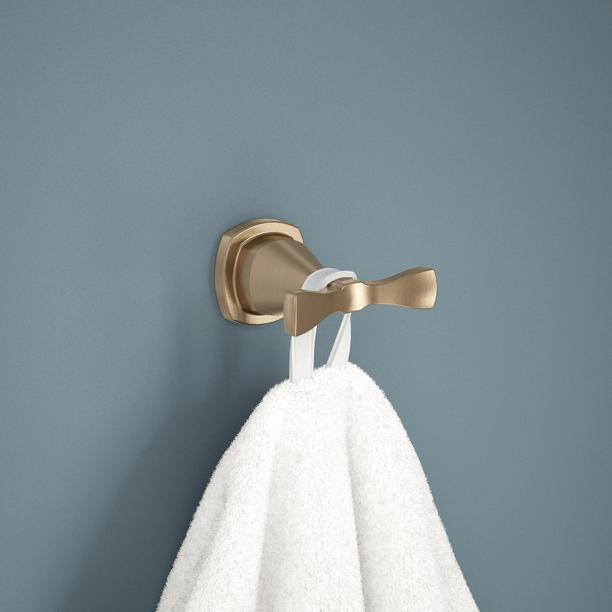 Delta Stryke close-up of champagne bronze finish on towel hook