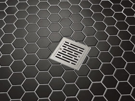 Delta tile-in square drain chrome finish complements contemporary showers.