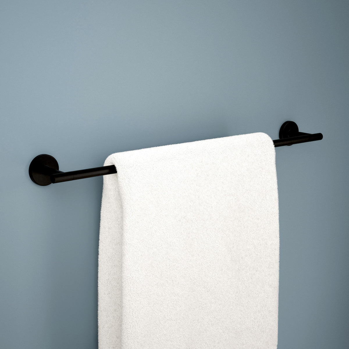 Front view of Delta towel rack in matte black with clean lines.