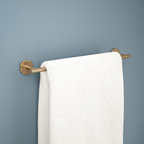 Delta Trinsic 18in towel bar champagne bronze hardware closeup shows durable zinc die-cast