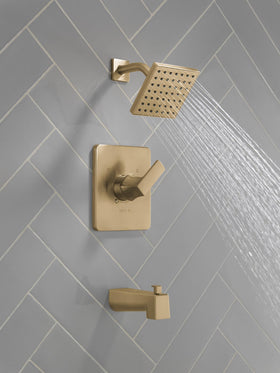 Delta Velum 14 brushed gold shower head showcases bold style and water-saving performance.