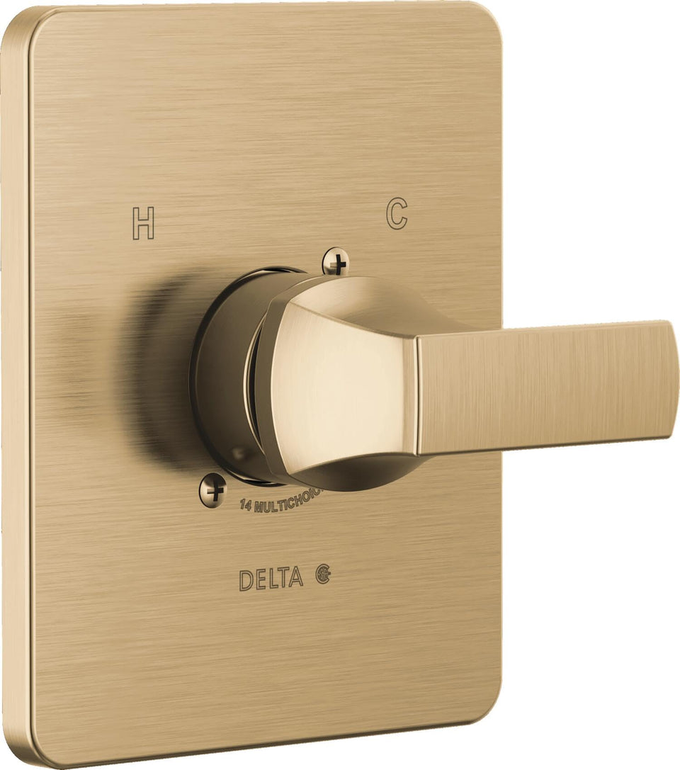 Delta Velum 14 Series brushed gold handle closeup showing contemporary hardware.