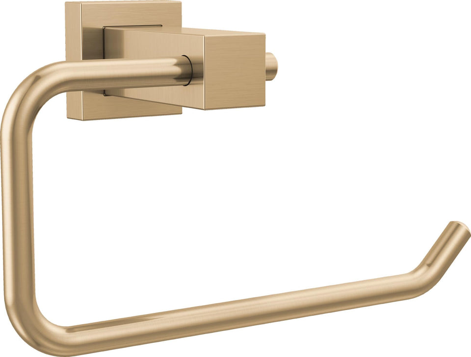 Delta Velum gold wall mounted toilet paper holder in a contemporary bath, space saving design