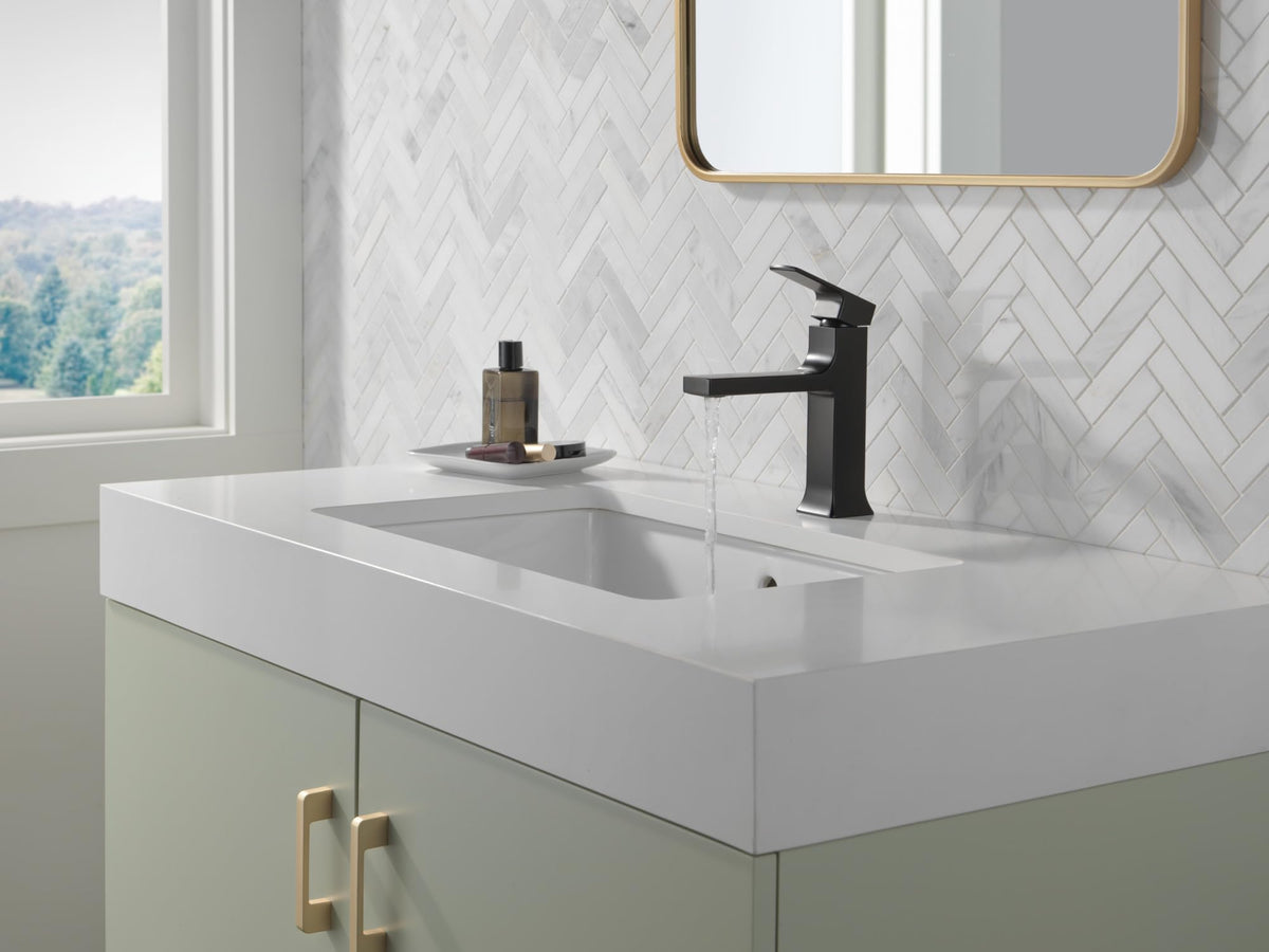 Delta Velum matte black faucet side view shows a durable finish for lasting style.