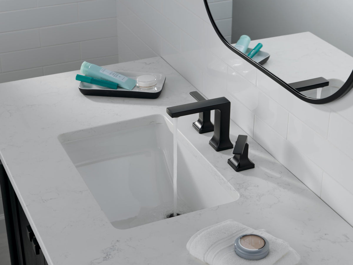 Delta Velum matte black faucet with push-pop drain demonstrates easy maintenance
